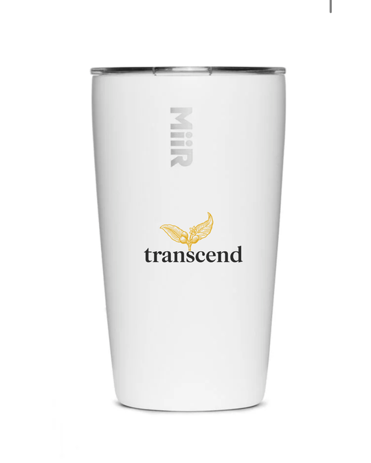 White insulated tumbler with 'Miir' and 'transcend' branding on a white background
